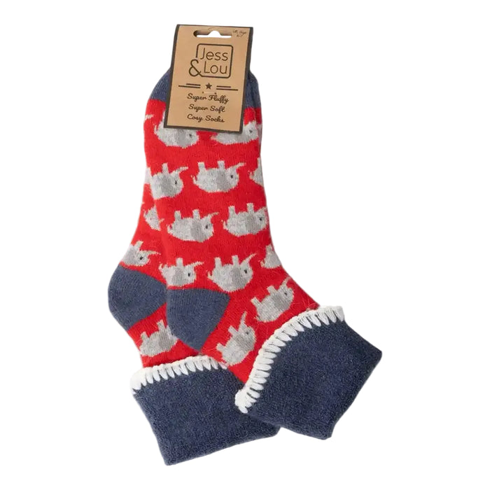 A pair of red and navy blue fleece socks with a grey elephant pattern, featuring a brown paper header card that reads 'Jess & Lou'.