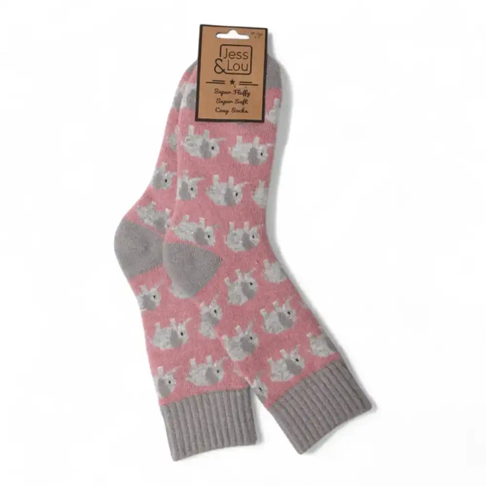 Pale pink and grey elephant socks with a grey ribbed cuff and solid grey heel and toe.