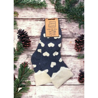 Navy blue background sock with cream hearts and a turned down cream ankle cuff