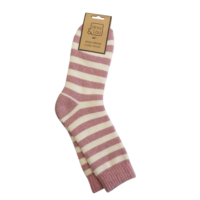 A pair of striped wool blend socks in dusty rose and cream, hanging from a kraft paper hanger on a light beige background.