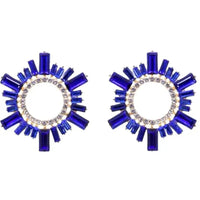 Pair of blue circular earrings with gemstone accents on a white background