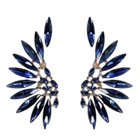 Pair of blue gemstone earrings on a white background