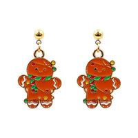 Gingerbread man earrings on a white background