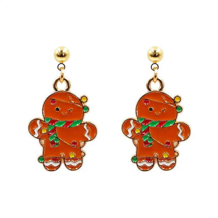 Gingerbread man earrings on a white background