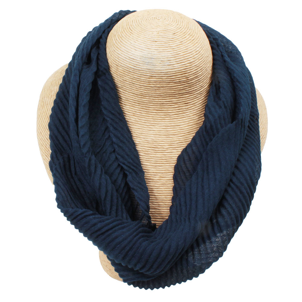 Navy blue medium length scarf in textured fabric.