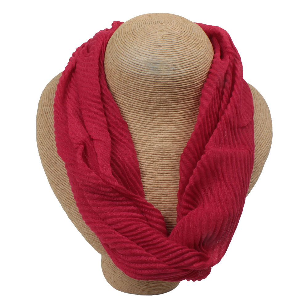 Red medium length scarf in textured fabric.