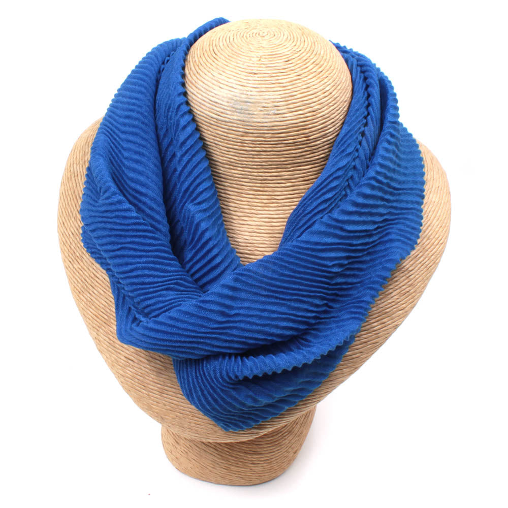 Royal blue medium length scarf in textured fabric.
