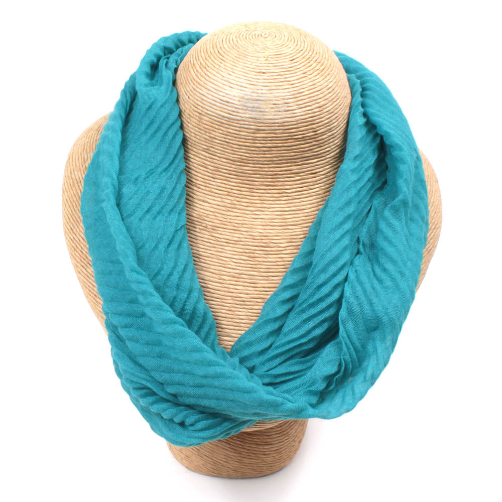 Teal medium length scarf in textured fabric.