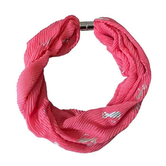 A pink twisted infinity-style fabric bracelet with small silver embroidered details and a silver metal clasp, shown on a plain white background.
