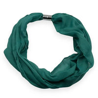 Green infinity scarf on a white background