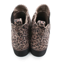 A pair of women's ankle boots featuring a brown and beige leopard print pattern with black soles, shown from a top-down view on a white background.
