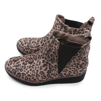 A pair of women's wedge ankle boots featuring a brown and beige leopard print pattern, black mesh side panels, and black soles, shown against a plain white background.