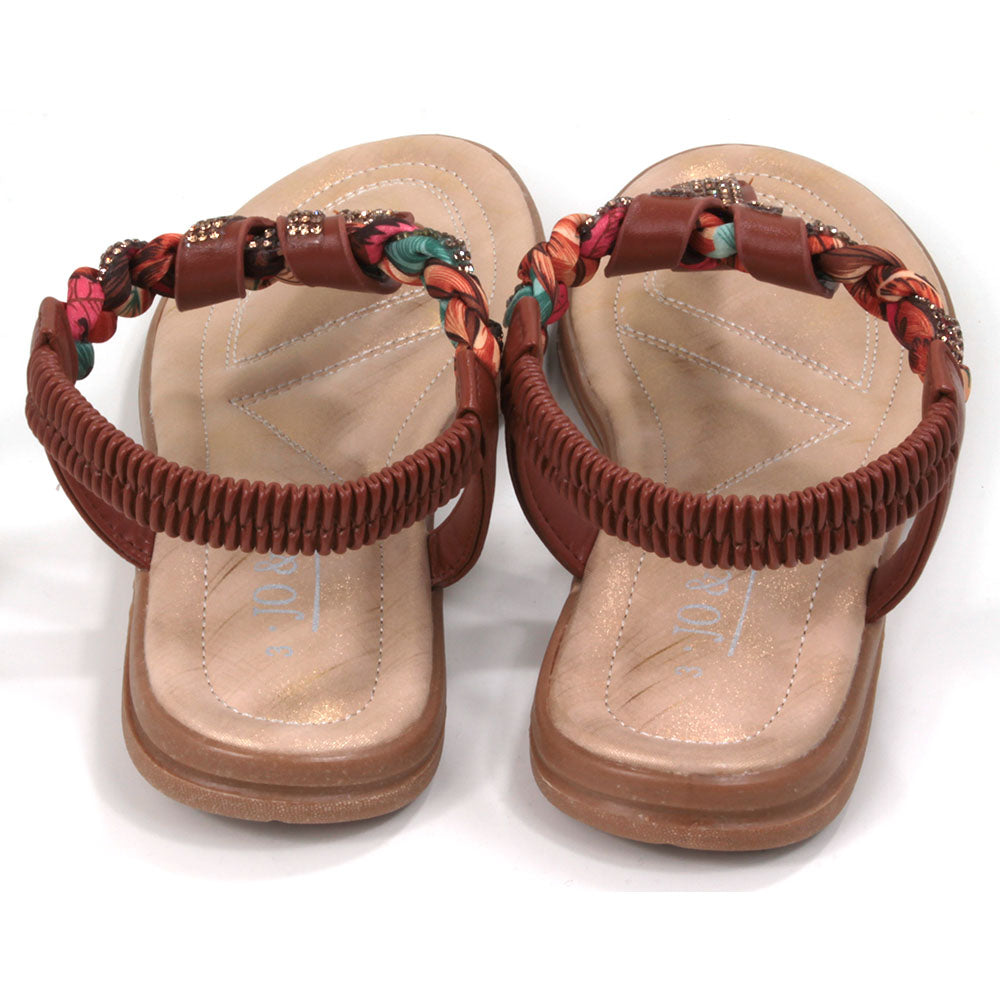 Tan coloured toe post sandals with elasticated back. Jewels and fabric decoration. Light tan coloured insoles. Back view.