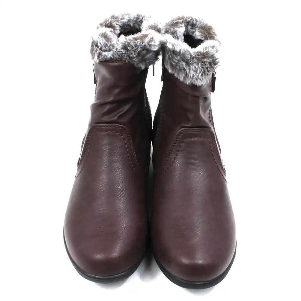 Pair of brown ankle boots with fur trim. Front view.