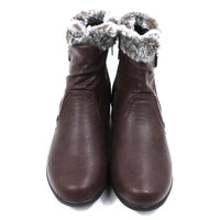 Pair of brown ankle boots with fur trim. Front view.