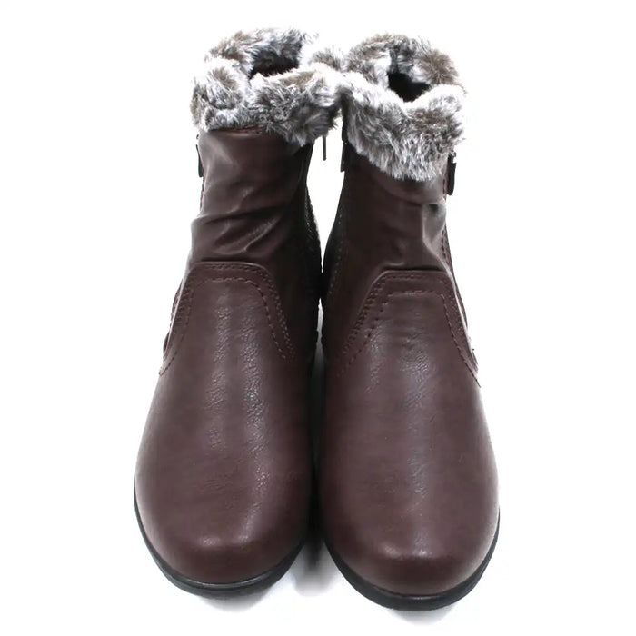 Pair of brown ankle boots with fur trim. Front view.