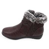 Brown ankle boot with fur trim showing zip fastening.