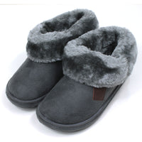 Jo and Joe charcoal bootie slippers with generous furry ankle cuffs. Angled view.