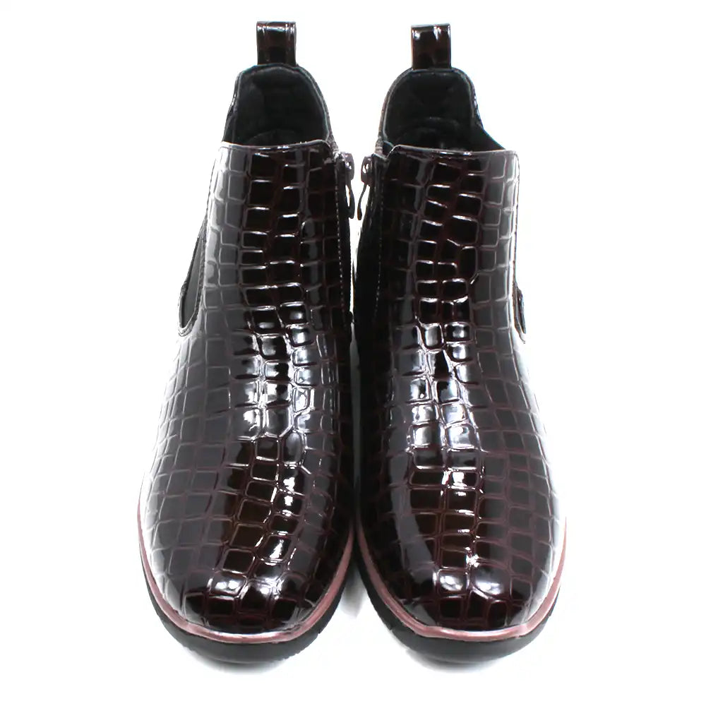 Jo and Joe mock patent crocodile Chelsea boots. Dark brown and black rubber soles. Front view.