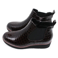 Jo and Joe mock patent crocodile Chelsea boots. Dark brown and black rubber soles. Side view.