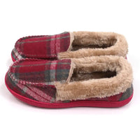 Red tartan full slippers with beige fur ankle collar and lining the inside. Red soles. Side view.