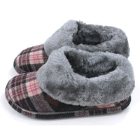 Grey and pink tartan slippers with grey fur ankle cuffs.