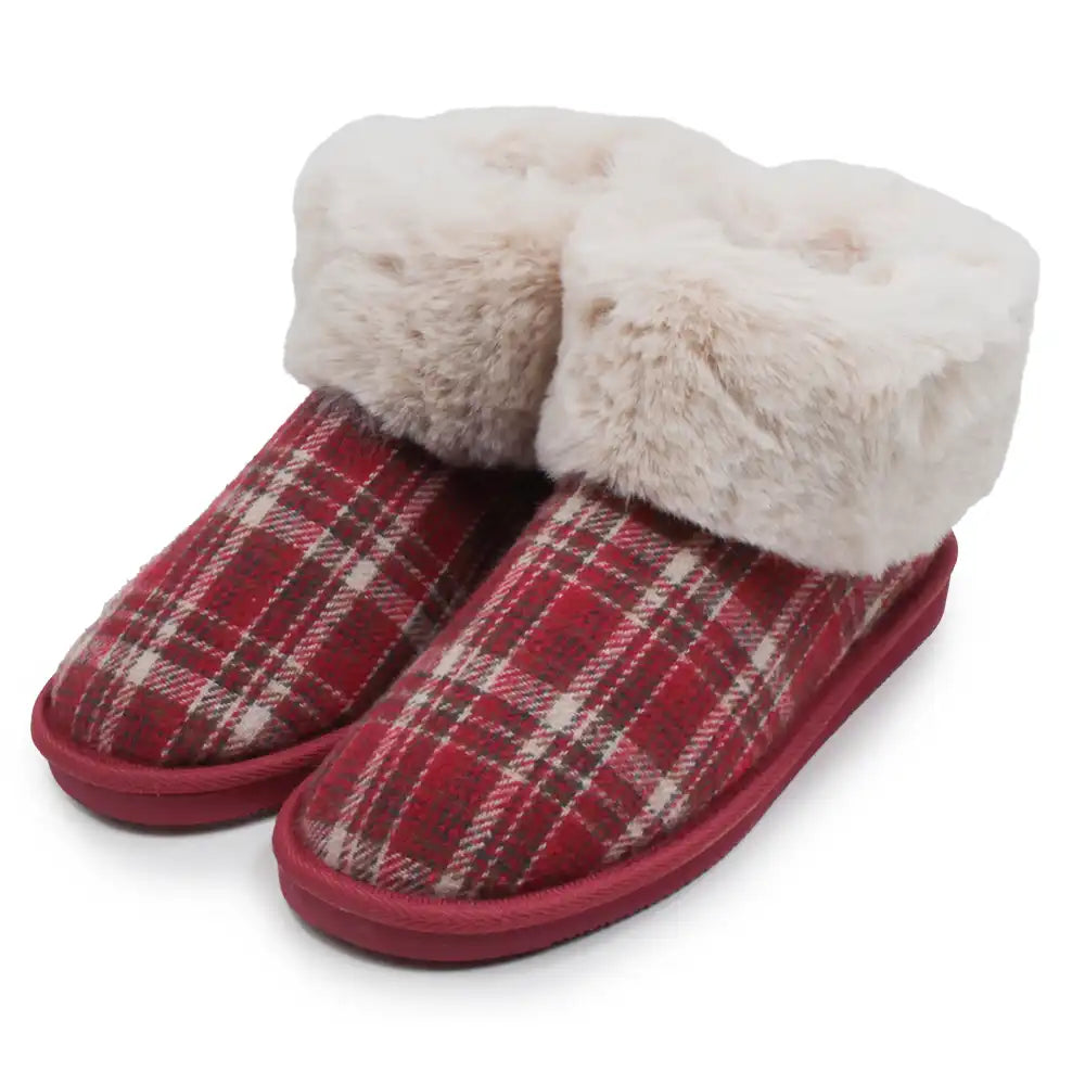 Red plaid slippers with cream furry ankle cuffs in a white studio environment.