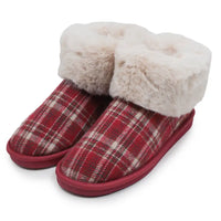 Red plaid slippers with cream furry ankle cuffs in a white studio environment.