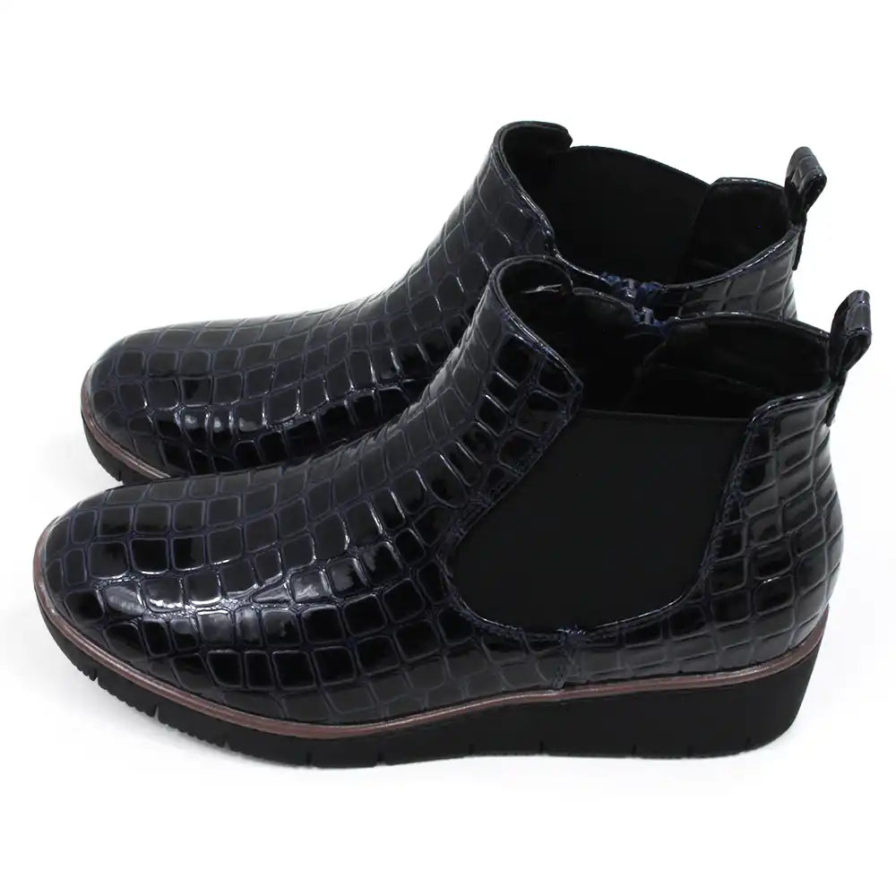 Mock croc navy blue Chelsea boots. Low heels. Side view.