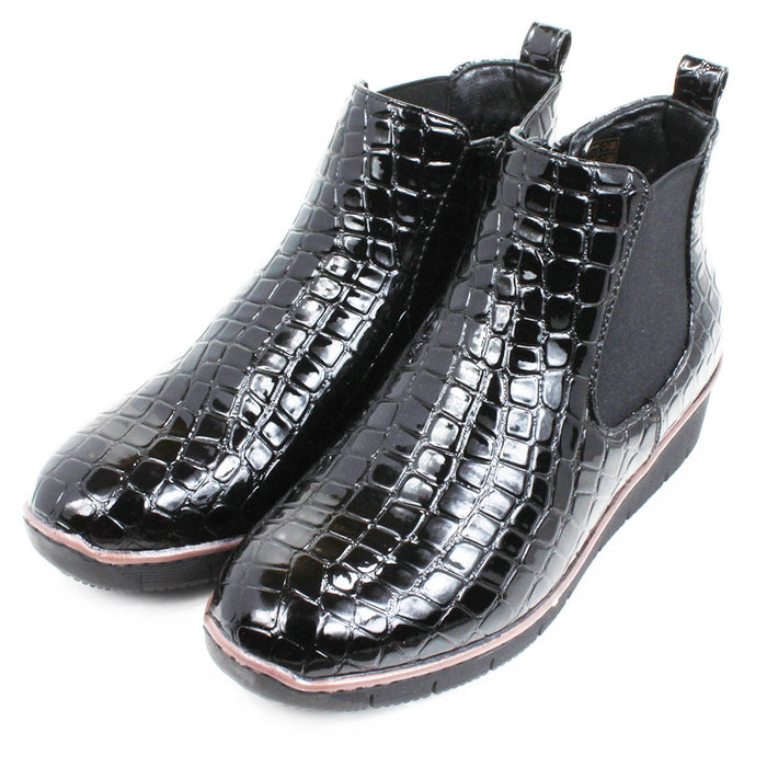 Jo and Joe black, mock croc, patent Chelsea style ankle boots with zip fitting and elasticated side panels. Angled view.