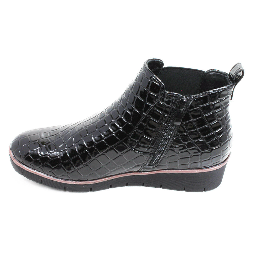 Jo and Joe black, mock croc, patent Chelsea style ankle boots with zip fitting and elasticated side panels. Single boot side view showing zip.