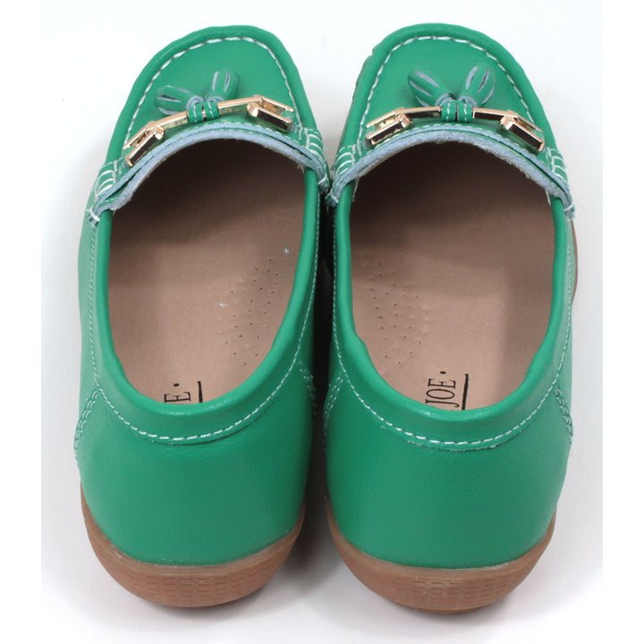 Jo and Joe Nautical mocassin style slip on shoes in emerald. Gold bar and tassels details on foot. Back view