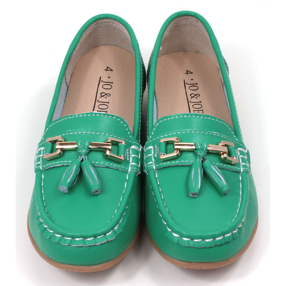 Jo and Joe Nautical mocassin style slip on shoes in emerald. Gold bar and tassels details on foot. Front view
