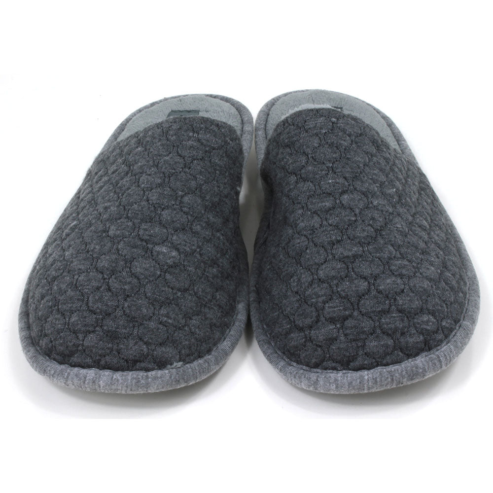 Grey mule slippers with sculpted waffle fabric. Lighter grey footbed and fabric around the soles. Front view. 