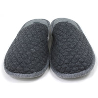 Jo and Joe grey mule slippers with sculpted waffle fabric. Lighter grey footbed and fabric around the soles. Front view. 