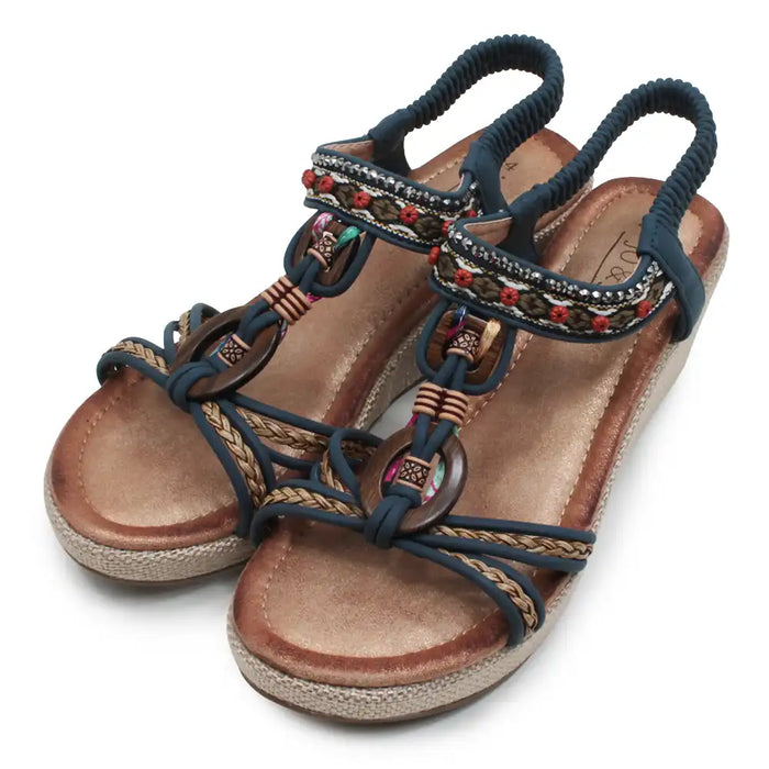 Wedge sandals with woven details.