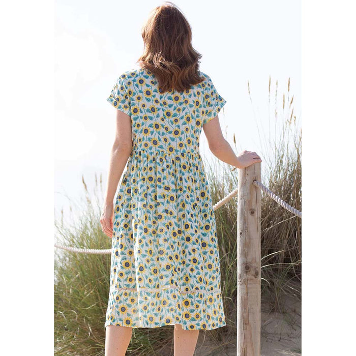 Kite Everley sunflowers muslin dress. Midi length and short sleeves. Back view.