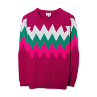 Kite bright cerise jumper with pink, green and light grey zig zag pattern. Flat view.