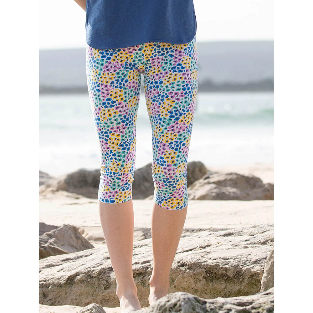 Kite brightly coloured over the knee leggings. Front view.