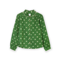 A green long-sleeve blouse with a delicate white floral pattern, featuring a decorative collar with gold chain accents and a button-up front.