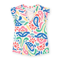 Colorful sleeveless top with abstract pattern on a white background