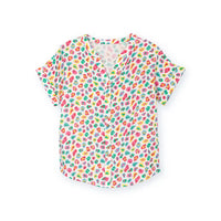 Short-sleeve shirt with colorful floral pattern on a white background