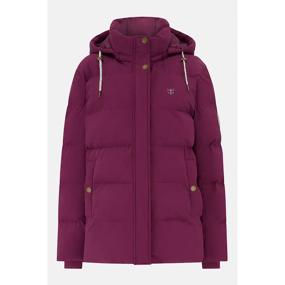 A women's hooded puffer jacket in a deep plum purple color, featuring horizontal quilting, gold-tone snap buttons, white drawstrings, and a small embroidered bird logo on the left chest.