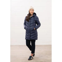 Person wearing a blue puffer coat against a white background