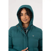 Person wearing a teal jacket with a hood on a white background