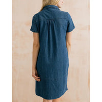 Back of denim looking dress with short sleeves, yoke at shoulder blades and falls to back of knee