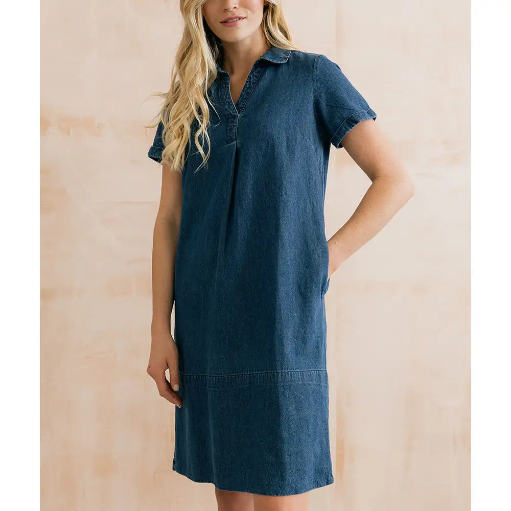 Front of denim looking dress with short sleeves, shirt collar and falls to just above the knee.