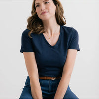 Navy blue top with short sleeves and V neck line