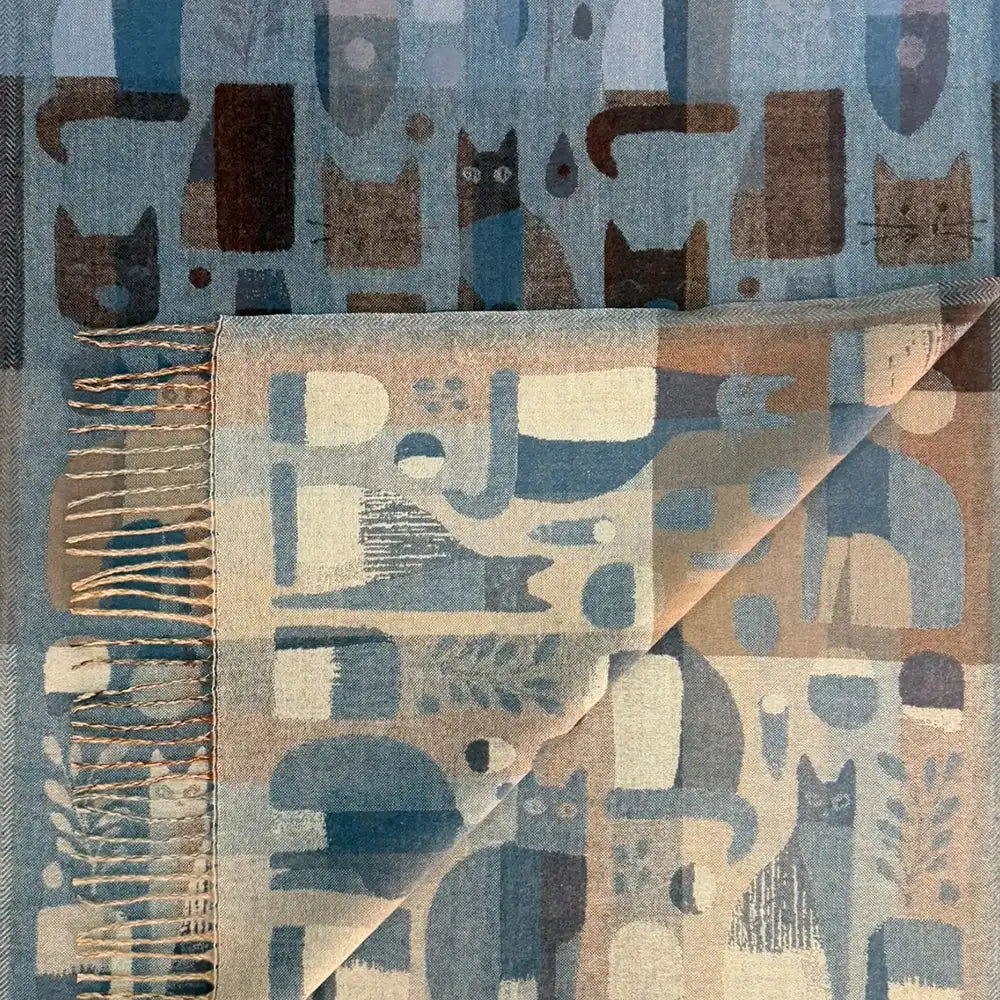Denim Blue scarf with tassels. Abstract cats feature on the scarf.