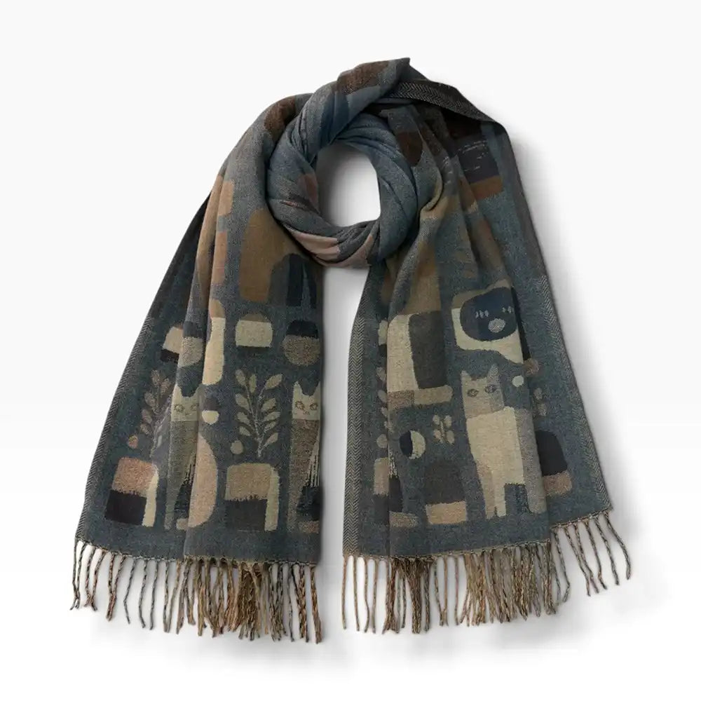 Denim Blue scarf with tassels on a white background. Abstract cats feature on the scarf.